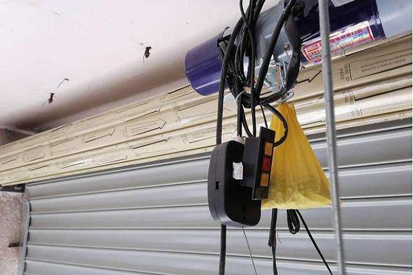 電動(dòng)卷簾門(mén)壞了卷不上去了怎么修